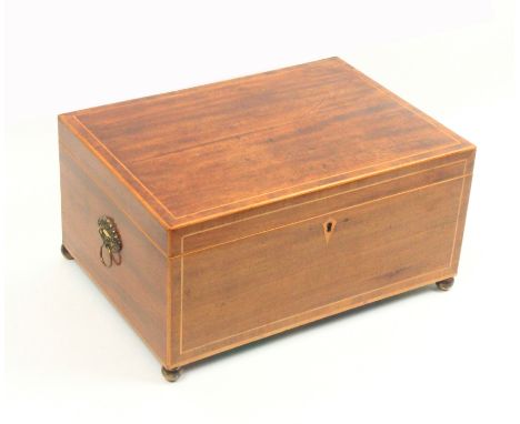 A Georgian mahogany, line inlaid and crossbanded rectangular sewing box, brass floral ring side handles on brass ball feet, t