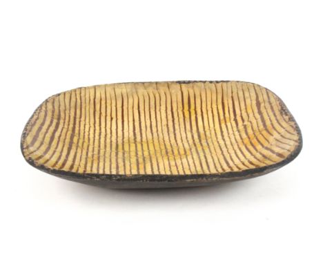 A large late 18th Century or earlier rectangular slipware comb decorated baking or loaf dish, pressed border, 47.5 x 38cm    