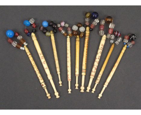 Lace Bobbins - nine turned bone spot named lace bobbins comprising Sofia Cowman/Elizabeth Sitratasy/ Sarah Jane Matthews/Will