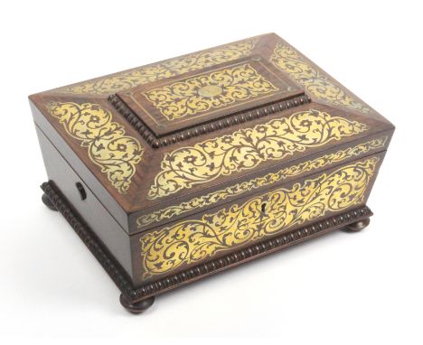A rosewood and brass inlaid sewing box of sarcophagal form, circa 1835, the lid and front with cut brass floral panels and qu