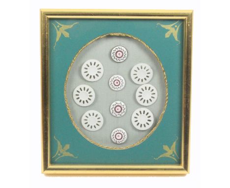 Buttons - a framed display, containing a set of six 18th Century Copenhagen ceramic buttons with pierced decoration one with 
