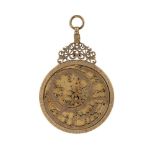 A DECORATIVE ISLAMIC BRASS ASTROLABE