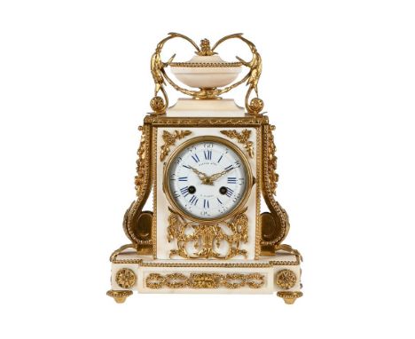 A FRENCH LOUIS XVI STYLE ORMOLU MOUNTED WHITE MARBLE MANTEL CLOCKRAINGO FRERES, PARIS, MID 19th CENTURYThe circular eight-day