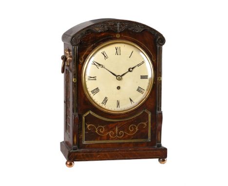 A WILLIAM IV BRASS INLAID CARVED MAHOGANY BRACKET TIMEPIECEUNSIGNED, CIRCA 1830The five pillar single fusee movement with anc