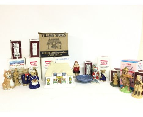 A collection of ceramic figures including Wade figurines, boxed Village Stories Cheese Dish etc. no obvious damage or restora