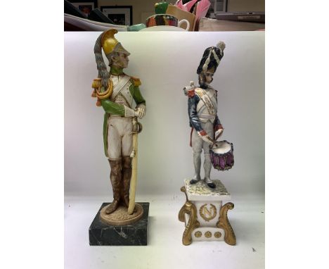 Four ceramic Napoleonic figures in various uniforms. Approx height 34cm, 35cm, 33cm, 35cm