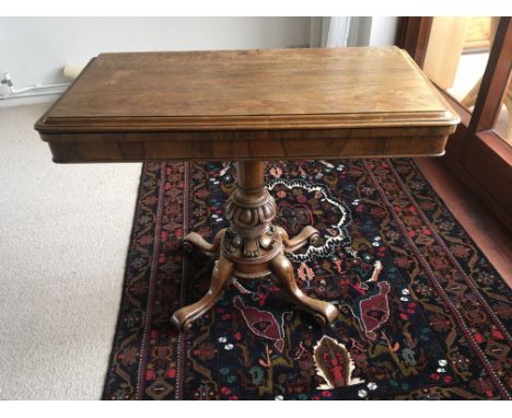 A William VI rosewood card table the hinged top on a carved column and splayed legs. No Reserve