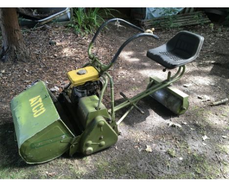 A Vintage ATCO power assisted ride on mower with wide blade grass collecting box and detachable roller seat.