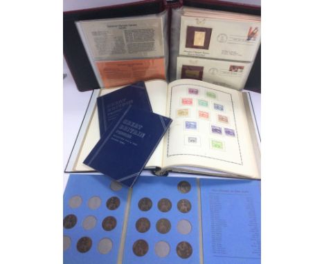 Four world stamp and first day cover albums and three GB penny albums. Shipping category C.