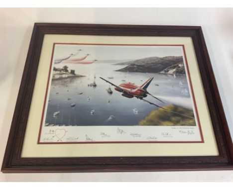 A framed RAF signed red arrow picture. Approx 45x55cm.