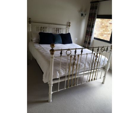 A Victorian brass and painted metal bed with ceramic roundels width approximately 155cm sold with a metal spring base linen a