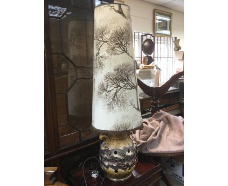 A mid 20th Century free standing pottery lamp, approx height including shade 120cm. Shipping category D. NO RESERVE