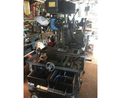 A Warco Minor Mill 11 speed engineering pillar drill with some accessories. Viewing by appointment only and buyer to collect.