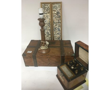 An antique metal bound box a Vintage brass portable testing set a lamp and a pair of Chinese silk embroideryâ€™s