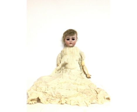 A large Kammer & Reinhardt German porcelain & wooden baby doll, approximately 52cm tall. postage category C