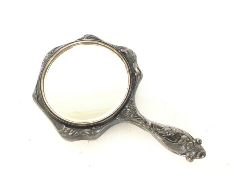 Vintage pewter hand mirror fully embossed with figures and flowers. Postage cat D