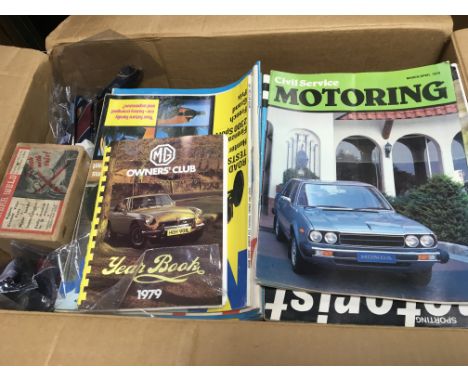 A box containing an interesting collection of Vintage motoring magazines and other items