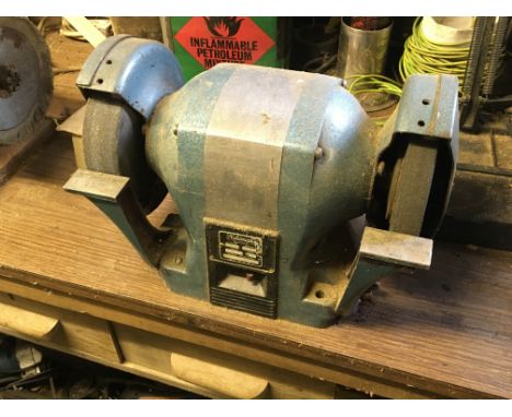 A bench top National British made double grinding wheel, A bench top belt sander and a bench top buffing finishing wheel.
