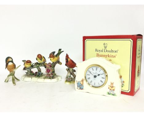 A collection of Goebel & Royal Adderley ceramic birds and a boxed Royal Doulton Bunnykins ceramic clock , postage cat D NO RE
