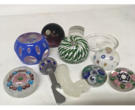 A collection of paperweightsA Perthshire paperweights Caithness and smaller paperweights. (a lot)