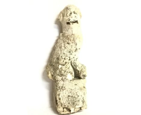 An antique carved stone Chinese temple dog of Fo statue, approximately 30cm tall. postage category D