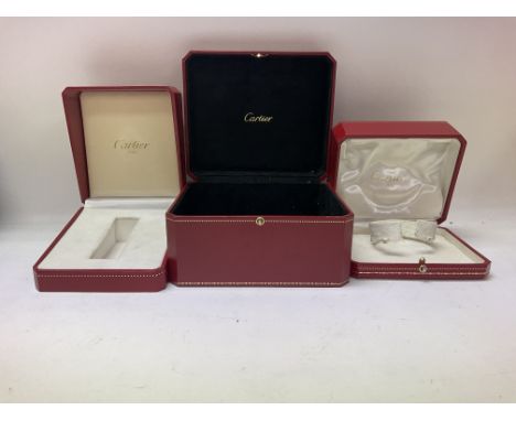 A collection of Cartier watch boxes and jewellery boxes and a Tissot watch case.