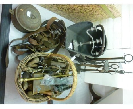 Early 20thC tools and metalware, viz. a coal scuttle; fire irons; and a pewter, three branch candelabrum  10''h       BSR