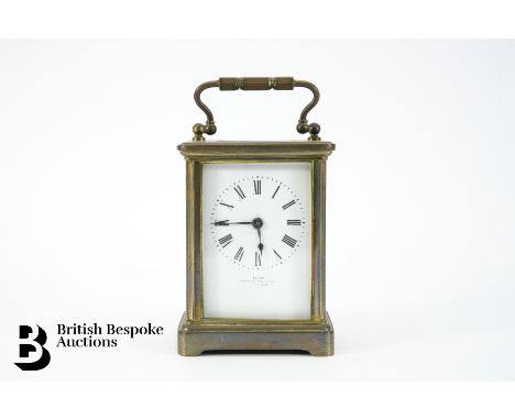 Elam Norwich brass carriage clock, white enamel face with Roman dial, approx 12 x 8 cms.&nbsp;