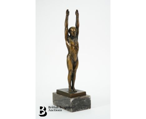 A 20th century bronzed gymnastic figure, approx 30 cms h. (af)Condition ReportWith some light wear behind the ankles.&nbsp;