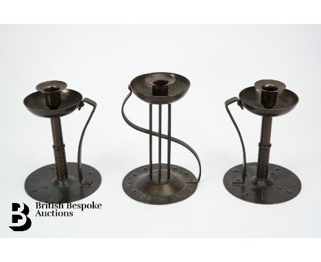 A pair of Arts and Crafts Hugo Berger, Goberg wrought iron candlesticks, stamped to base, measures approx. 19.5cms h, togethe