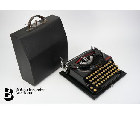 A vintage Imperial typewriter, The Good Companion, made in Leicester, England, in the original storage box.&nbsp;