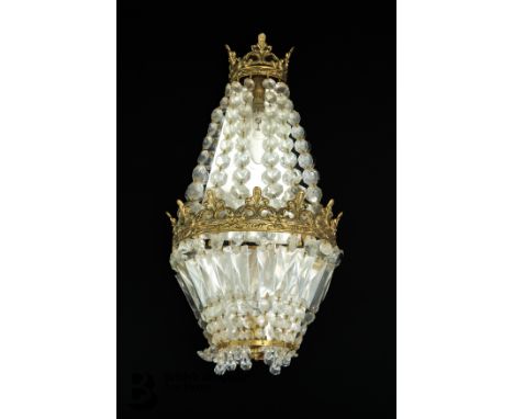 A 20th century glass and brass light fitting, approx 50 cms in length, together with a French brass and crystal drop wall sco