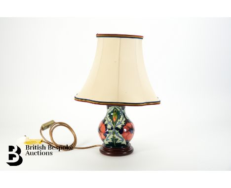 Moorcroft Poppy lamp base and silk shade, designed by Rachel Bishop, of bulbous form on a turned wood base, the lamp base is 