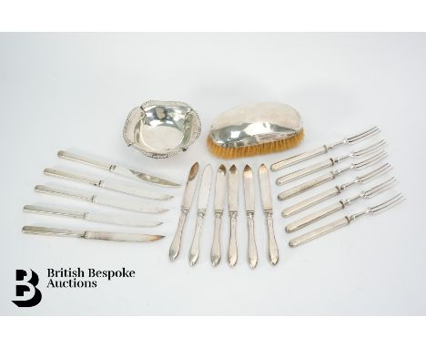 Silver fruit knives and forks, Sheffield hallmark (date and makers marks rubbed), six silver butter knives, silver hair brush