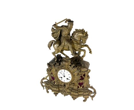 French - mid 19th century gilt spelter 8-day mantle clock, detailed armorial case with weapons of war, surmounted by a gallop