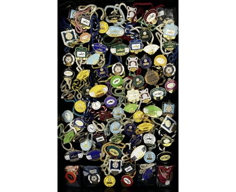 Seventy-five 1970s, 80s, 90s and early 2000s York enamel members' racecourse badges, together with a bronzed example for the 