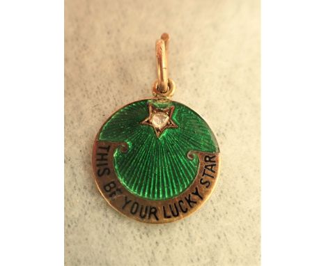 A GUILLOCHE ENAMEL AND DIAMOND PENDANT inscribed "This be your lucky stars"