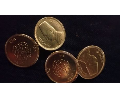 A PAIR OF GOLD COLOURED METAL CUFFLINKS formed from Egyptian coins, gross weight 7 grams (coins thought 22k) 