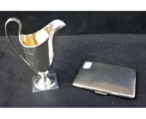 AN ELIZABETH II ENGINE TURNED SILVER RECTANGULAR CIGARETTE CASE London 1954, and an Edward VII cream jug of Georgian style, C