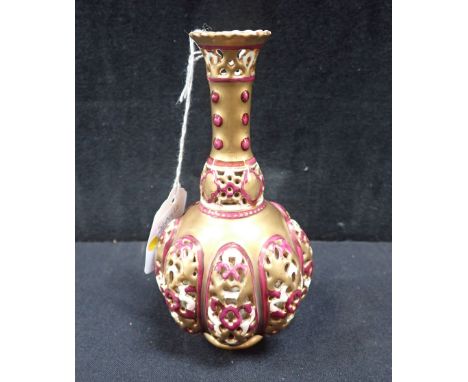 A ZSOLNAY RETICULATED AND GILT VASE of bulbous form 15cm high (small chips to foot)