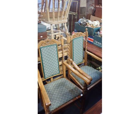 A PAIR OF 1920S LIGHT OAK ARMCHAIRS with barley-twist legs and supports, and upholstered back panels and drop-in seats (2)