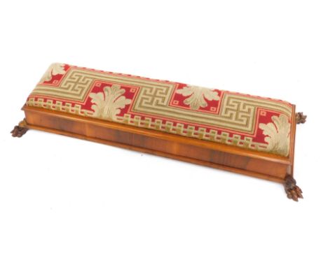 A 20thC fireside stool, the rectangular tapestry top, raised on a moulded base on claw feet, 18cm high, 111cm wide, 40cm deep