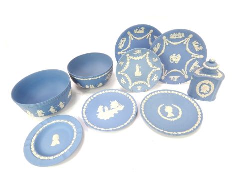 A group of Wedgwood blue jasperware, to include lidded caddy, 17cm high, two bowls, of differing designs, 20cm diameter, vari