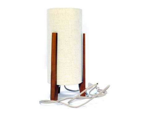 A mid century teak and fabric table lamp, with cream shade, 36cm high.