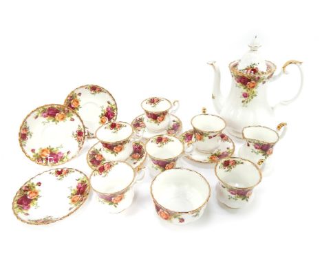 A Royal Albert Old Country Roses coffee service, comprising coffee pot, six coffee cups and saucers, milk jug and sugar bowl.