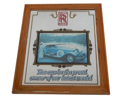 A 20thC advertising mirror for Rolls Royce, central panel displaying photographic print of a lady beside a vintage car, above