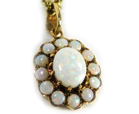 A 9ct gold opal pendant and chain, the floral design pendant set with oval opal and surrounded by twelve smaller ovals, 2cm h