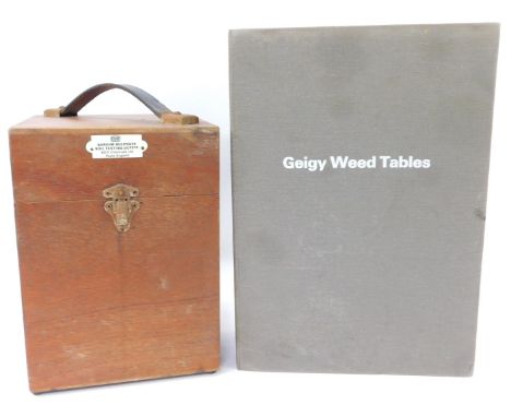 A BDH Barum silver plate soil testing kit, in oak case, 24cm high, together with Geigy weed tables, linen box containing vari