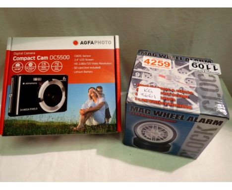Agfa Compact camera OC5500 and a mag wheel alarm clock. UK P&amp;P Group 2 (£20+VAT for the first lot and £4+VAT for subseque