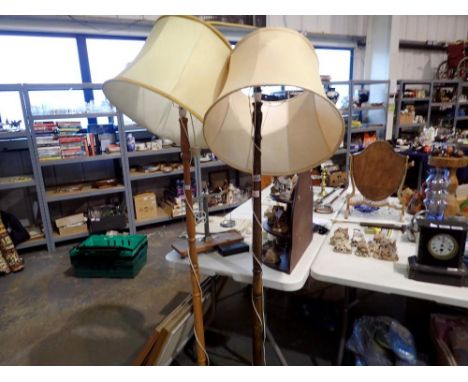 Two turned wood standard lamps. All electrical items in this lot have been PAT tested for safety and have passed. This does n